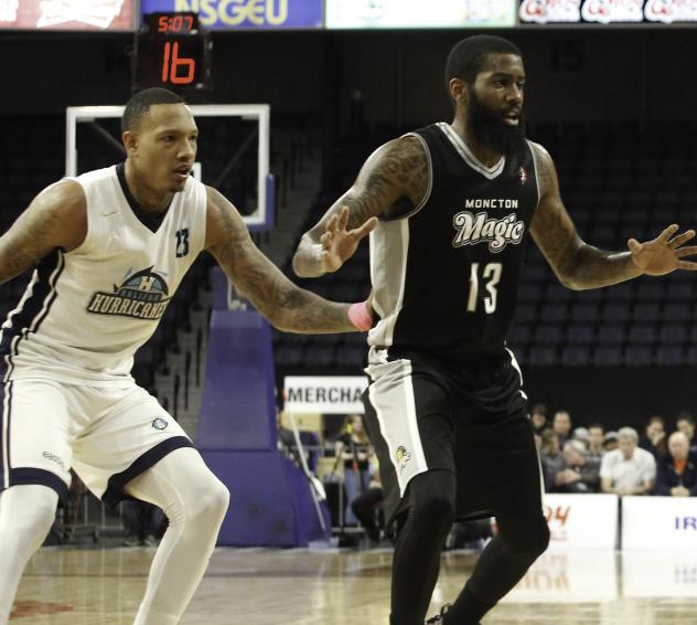 Billy White of the Halifax Hurricanes (left) and Terry Thomas of the Moncton Magic