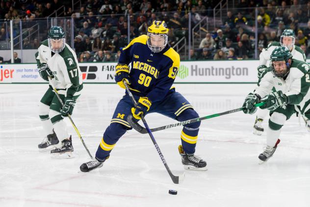 Forward Dexter Dancs with the University of Michigan