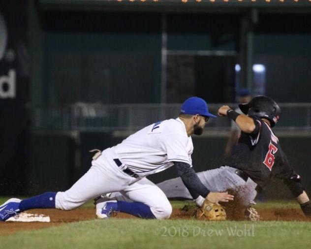 Rylan Sandoval of the Rockland Boulders tags out a New Jersey Jackals player attempting to steal