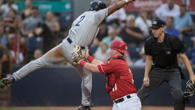 Vancouver Canadians C Brett Wright tags Tri-City Dust Devils 2B Xavier Edwards