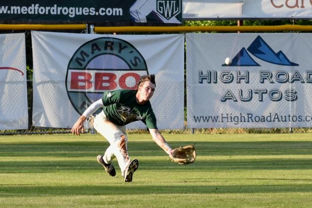 Cole Carder of the Medford Rogues about to make a shoestring catch