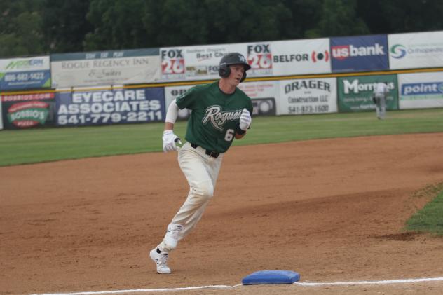 Cole Carder of the Medford Rogues rounds third