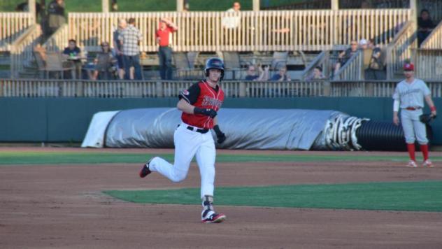 Sam Huff of the Hickory Crawdads round the bases