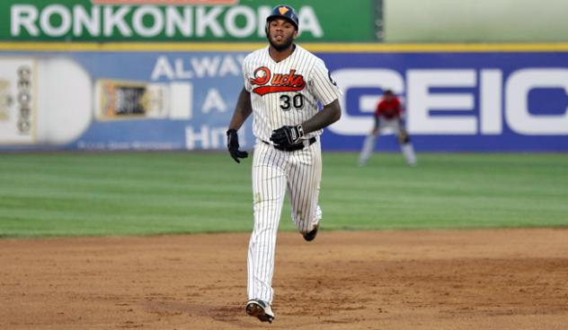 David Washington of the Long Island Ducks rounds the bases