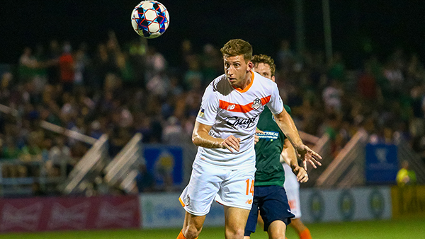 Josh Morton of Tulsa Roughnecks FC delivers a header in a 3-2 loss to Saint Louis FC