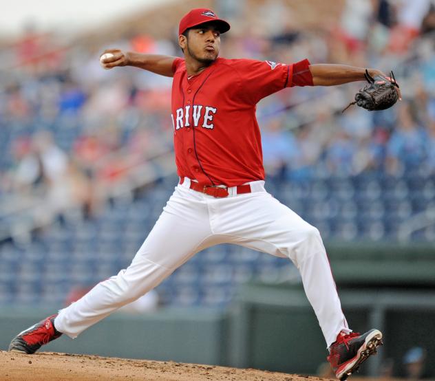 Greenville Drive pitcher Denyi Reyes prepares to throw