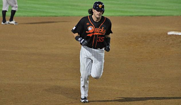 Taylor Ard of the Long Island Ducks rounds the bases after his solo homer