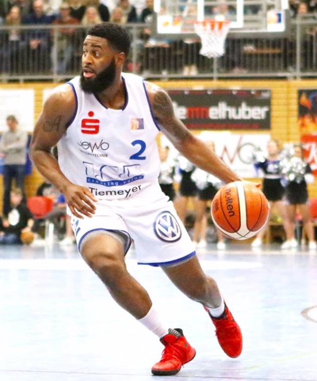 PG Ashton Smith handles the ball
