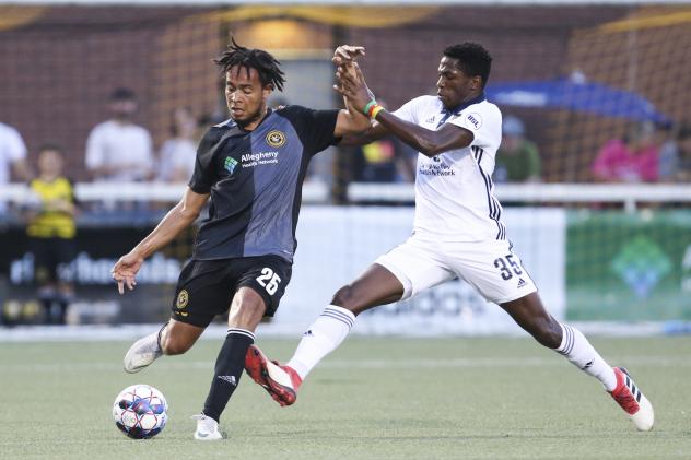 Faris of Bethlehem Steel FC maintains possession against the Pittsburgh Riverhounds