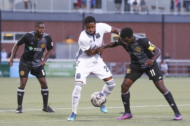 Marcus Epps of Bethlehem Steel FC battles for the ball against the Pittsburgh Riverhounds