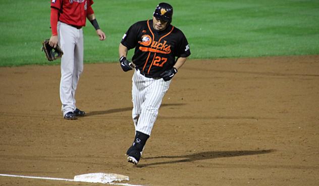 Dioner Navarro rounds the bases for the Long Island Ducks