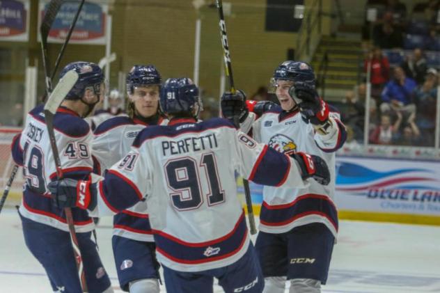 Saginaw Spirit celebrate a goal in the season opener