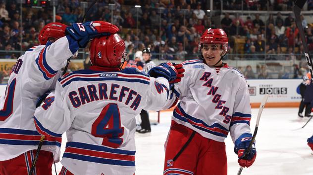 Kitchener Rangers celebrate a goal in the season opener