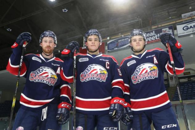 Saginaw Spirit captain Damien Giroux flanked by alternate captains Brady Gilmour and D.J. Busdeker