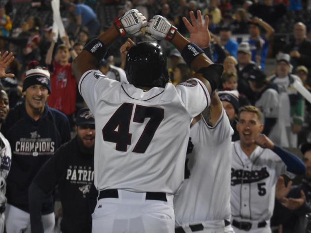 Somerset Patriots celebrate Endy Chavez's home run