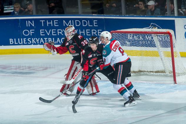 Kelowna Rockets in front of the Prince George Cougars goal