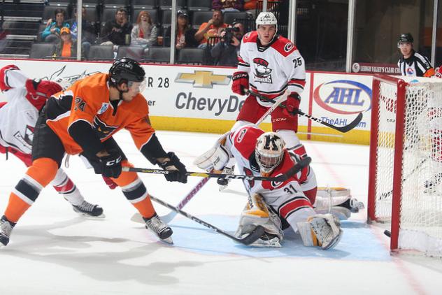 Carsen Twarynski of the Lehigh Valley Phantoms scores against the Charlotte Checkers