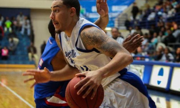 Tyrrel Tate drives to the basket