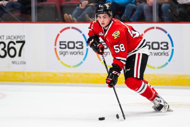 Clay Hanus of the Portland Winterhawks handles the puck