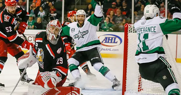 Iowa Stars celebrate a Joel L'Esperance goal against the Grand Rapids Griffins