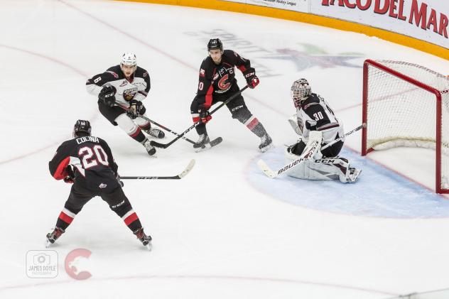 Vancouver Giants goaltender David Tendeck readies for a Prince George Cougars shot attempt