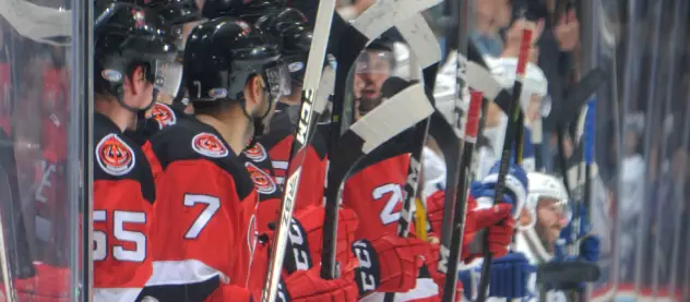 Binghamton Devils bench watches the action