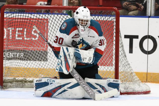 Kelowna Rockets goaltender Roman Basran smothers the puck