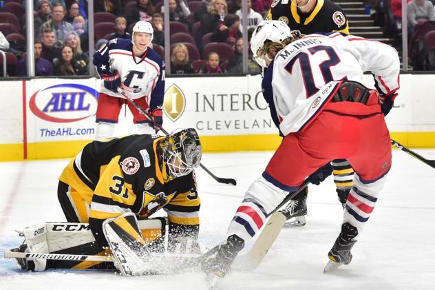 Ryan MacInnis of the Cleveland Monsters takes a shot against the Wilkes-Barre/Scranton Penguins