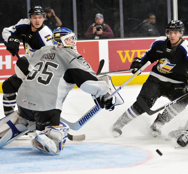 San Antonio Rampage goaltender Ville Husso fights off the Colorado Eagles' attack