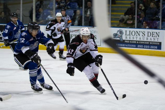 Vancouver Giants C JustinSourdif races for the puck vs. the Victoria Royals