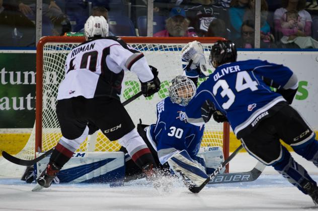 Milos Roman of the Vancouver Giants tests the Victoria Royals defense