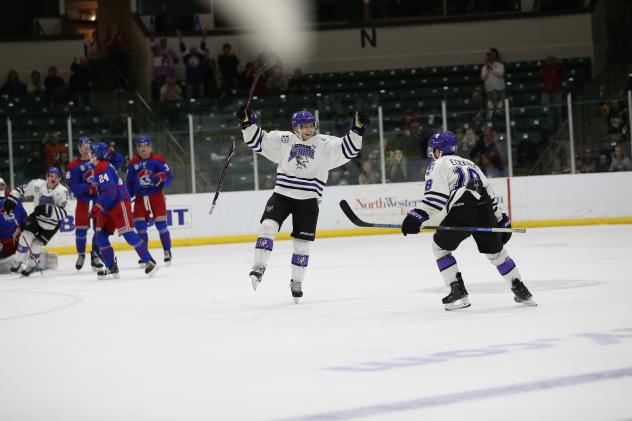 Tri-City Storm celebrate a goal vs. the Des Moines Buccaneers