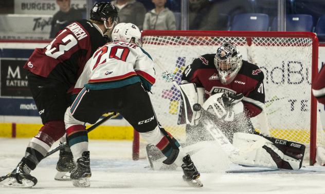 Vancouver Giants goaltender Trent Miner stops a shot by the Kelowna Rockets