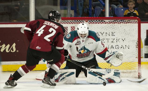 Vancouver Giants C Justin Sourdif moves in on the Kelowna Rockets goaltender