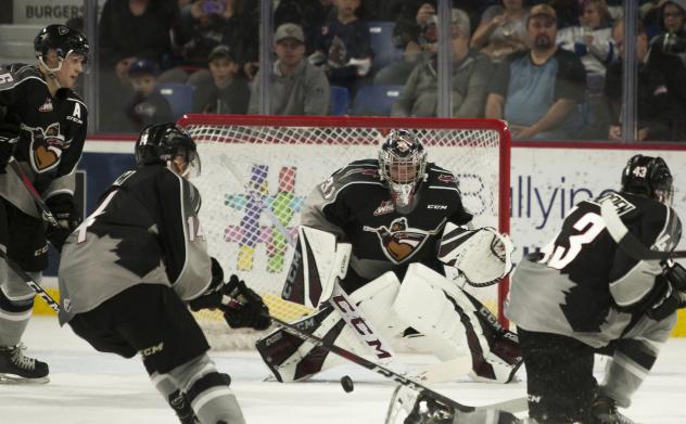 Vancouver Giants goaltender Trent Miner surveys his defenders