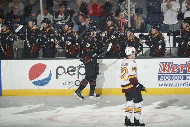 LW Eric Robinson and the Cleveland Monsters bench