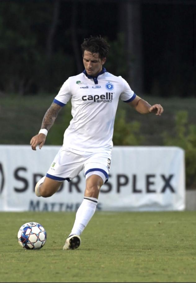 Midfielder Dan Metzger with Penn FC