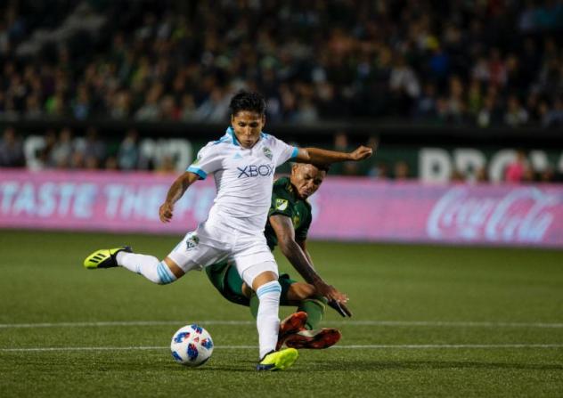 Seattle Sounders FC battle the Portland Timbers