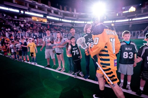 Georgia Swarm defenseman Alex Crepinsek enters the field