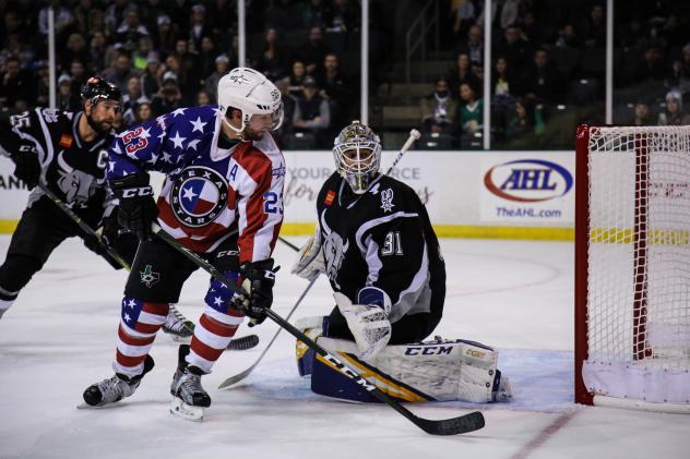 San Antonio Rampage goaltender Jordan Binnington turns aside a shot from Travis Morin of the Texas Stars