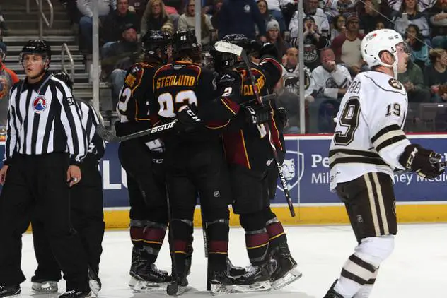 Cleveland Monsters celebrate a goal vs. the Hershey Bears