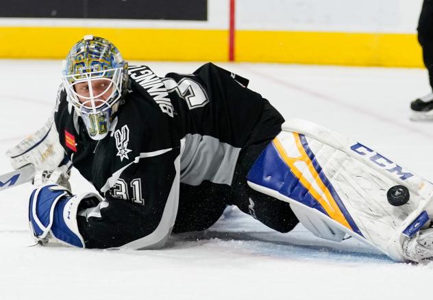 San Antonio Rampage goaltender Jordan Binnington lunges for a pad save in the shootout