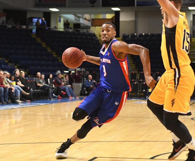 Jamal Reynolds of the Cape Breton Highlanders drives to the hoop vs. the London Lightning