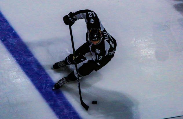 Utah Grizzlies forward Cole Ully with the puck