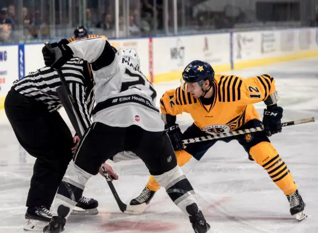 Norfolk Admirals RW Ben Duffy (12) faces off with the Manchester Monarchs