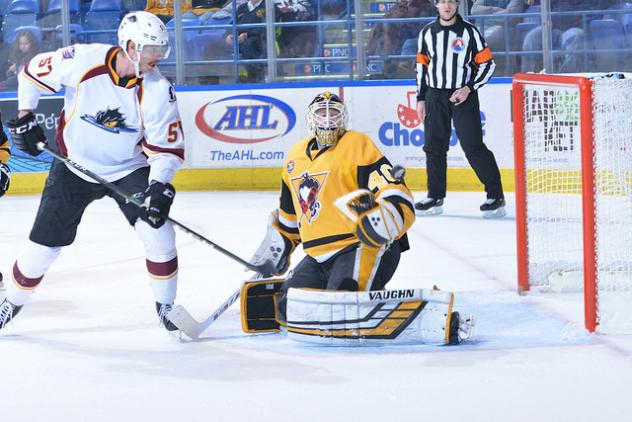 Cleveland Monsters LW Paul Bittner tests Wilkes-Barre/Scranton Penguins goaltender John Muse