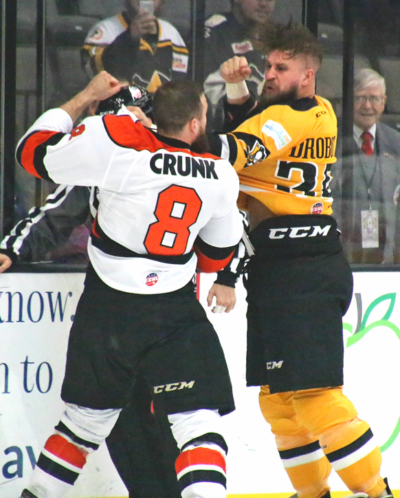 Fort Wayne Komets LW Taylor Crunk battles Wheeling Nailers forward Brad Drobot