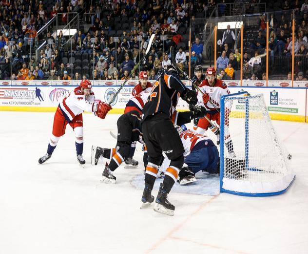 Allen Americans and Kansas City Mavericks battle in front of the Allen net