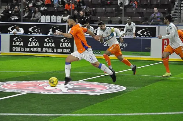 Mississauga MetroStars' Mo Babouli in action against the Florida Tropics