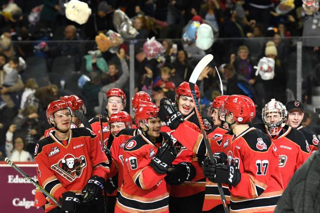Calgary Hitmen and Kaden celebrate Elder's Teddy Bear Goal
